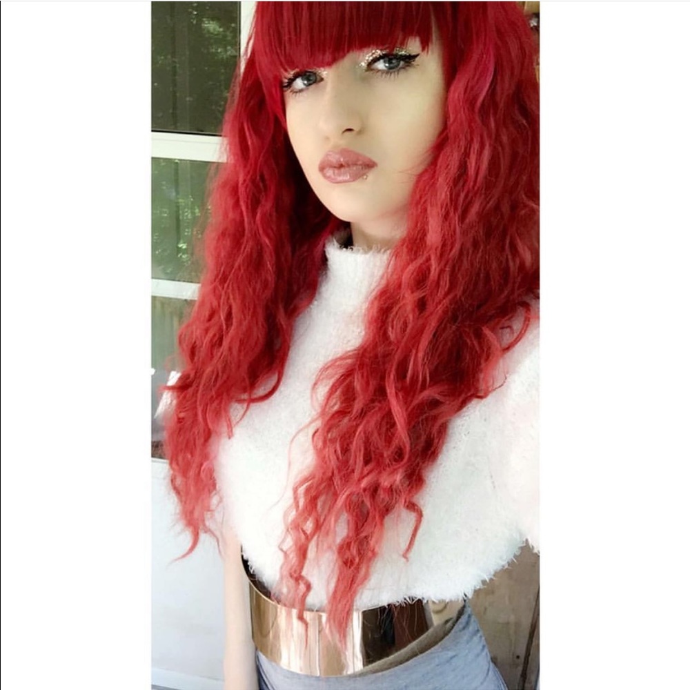 White fur shirt.